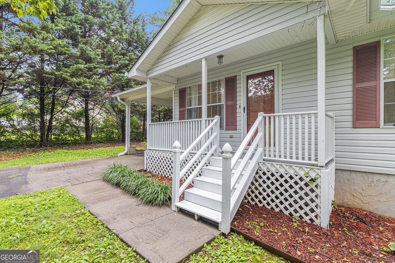 Looking for serene country living just minutes from town? Discover peace and quiet in this beautiful 4-bedroom, 2-bath home nestled in a tranquil setting. Inside, you'll find a spacious family room with a cozy fireplace and abundant natural light, an inviting eat-in kitchen and a screened-in porch perfect for sipping morning coffee while overlooking the serene rock garden. Whether you're starting fresh or slowing down, this home offers the space, privacy, and charm you've been searching for-all just a short drive from town.