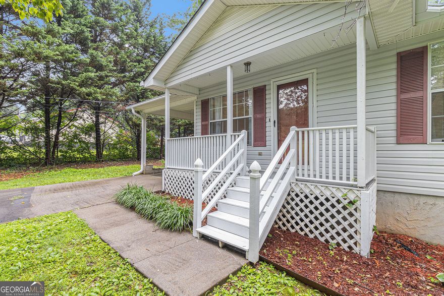 Looking for serene country living just minutes from town?  Discover peace and quiet in this beautiful 4-bedroom, 2-bath home nestled in a tranquil setting. Inside, you'll find a spacious family room with a cozy fireplace and abundant natural light, an inviting eat-in kitchen and a screened-in porch perfect for sipping morning coffee while overlooking the serene rock garden. Whether you're starting fresh or slowing down, this home offers the space, privacy, and charm you've been searching for-all just a short drive from town.