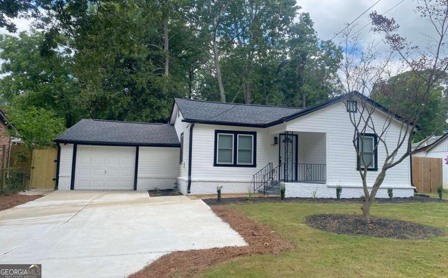 Welcome to this beautifully renovated ranch-style home in the heart of Marietta. Featuring 3 bedrooms and 3 full bathrooms, this property has been thoughtfully updated inside and out. The home offers a single-car garage, a newly built extended driveway, and a brand-new roof for peace of mind.  Inside, you'll find luxury vinyl plank flooring throughout, tile in all bathrooms, and a stylish quartz countertop kitchen that seamlessly flows into the spacious dining area. New windows that makes the house energy efficient. Every appliance is brand new, making this home move-in ready.  Enjoy the fresh curb appeal with newly planted sod in the front yard, while the large fenced backyard provides an ideal space for play, pets, or outdoor entertaining.  Perfectly situated just minutes from Marietta Square, Dobbins Air Force Base, local parks, Life University, Braves Stadium/Truist Park, shopping, dining, and easy access to the highway, this home truly offers convenience and lifestyle. With no HOA and no rental restrictions, the possibilities are endless.  This property is vacant and on Supra, schedule your showing today before it's gone!