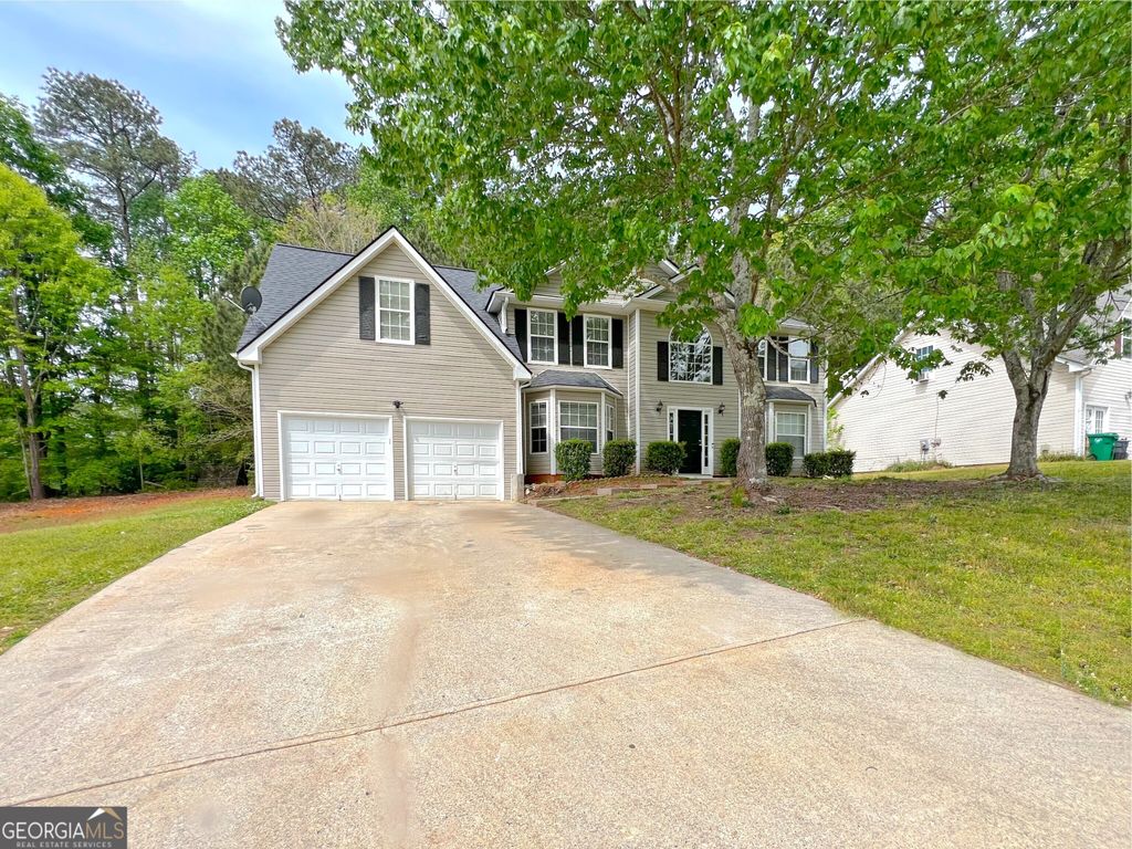 Photo of 5983 Hitt Lake Trail, Stone Mountain, GA 30087 (MLS # 10731363)