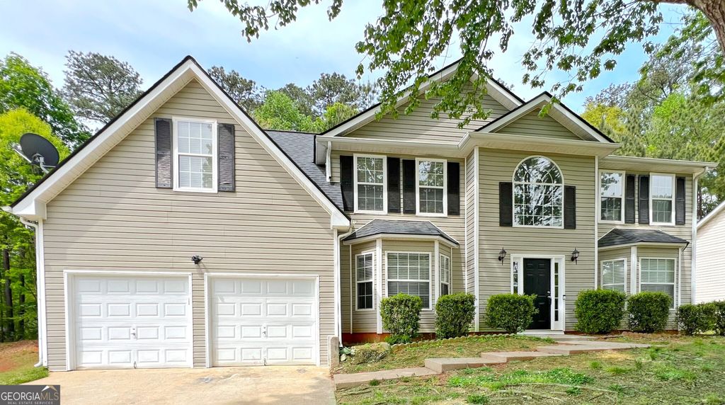 Photo of 5983 Hitt Lake Trail, Stone Mountain, GA 30087 (MLS # 10731363)