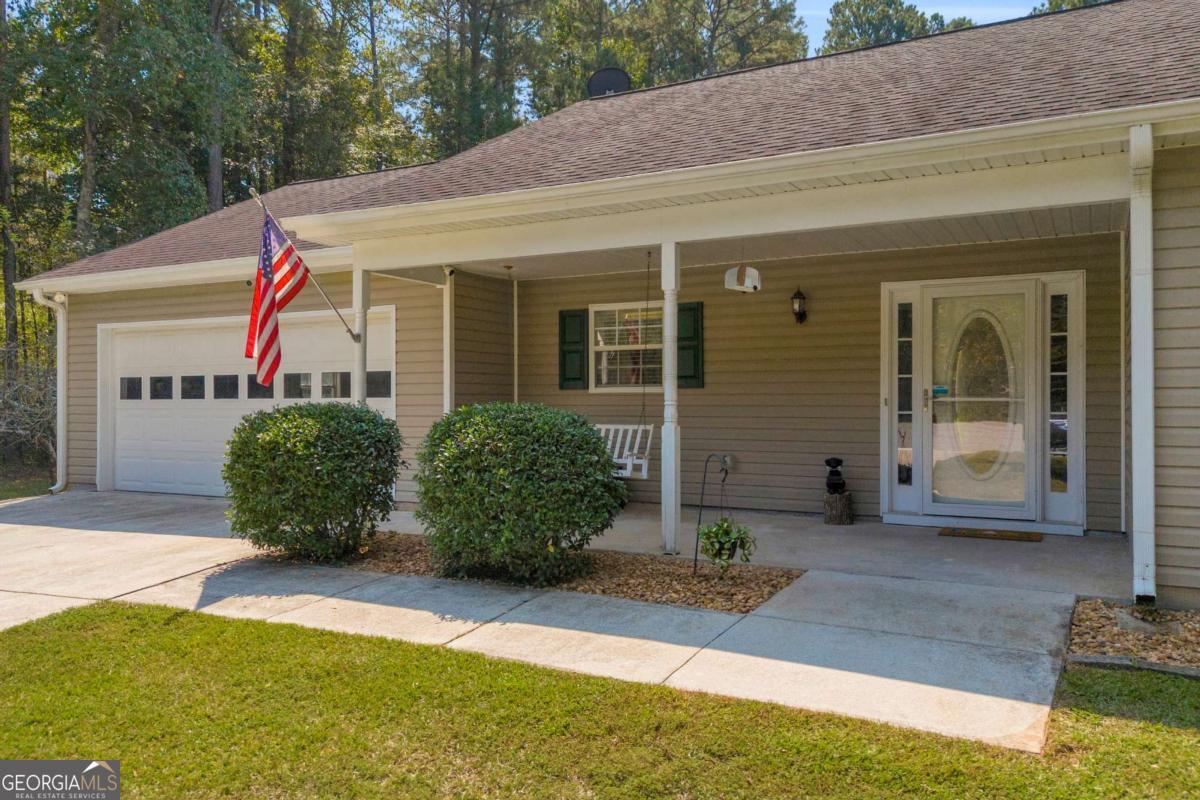 Charming 3 Bedroom / 2 Bath Ranch on 1.62 Acres with Detached Shop Welcome to this adorable ranch home tucked inside the established neighborhood of The Grove! Set on a spacious 1.62-acre lot, this property offers comfort, convenience, and plenty of extras you won't want to miss. Step inside to find a bright kitchen with breakfast area and mud nook, new LVP flooring and tile throughout (no carpet!), and fresh paint that gives the home a move-in ready feel. The primary suite is a true retreat with a double trey ceiling, beautifully remodeled bath featuring double vanities, and a closet system designed to keep everything organized. Outside, enjoy the large fenced backyard complete with an above-ground pool and deck, a cozy fire pit area, and both a covered rear patio and front porch with swing-perfect for entertaining or simply relaxing. Need extra space? The 24 x 40 detached shop/garage with power is ideal for hobbies, storage, or a home workshop. Plus, the seller is leaving appliances, blinds, cameras, new thermostat, storm doors, and the front porch swing for the new owner's convenience. With vinyl siding for low maintenance, thoughtful updates, and a prime location near schools, shopping, and dining, this home has it all! Don't miss this opportunity to own a stylish ranch with acreage, modern upgrades, and room to spread out.