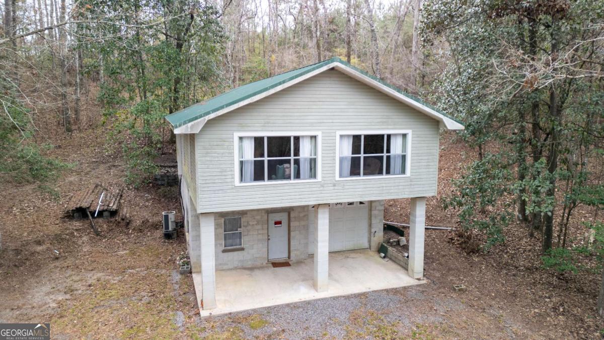 Take in breathtaking river views from this peaceful Eason's Landing retreat, perfectly positioned near the pristine public landing for easy water access. Built in 2007, the upper level features two comfortable bedrooms, a full bathroom, and an inviting open-concept living, dining, and kitchen area-ideal for relaxing or entertaining. Downstairs, you'll find a full bath and laundry area, with plenty of room to create additional finished living space. Whether you're looking for a weekend getaway or a serene full-time residence, this charming property offers the best of waterfront living.