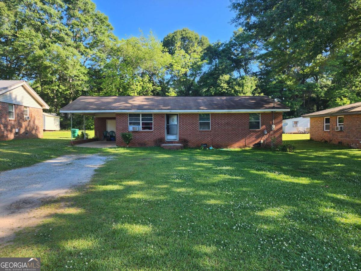 INVESTOR SPECIAL, tenant in place! Cozy brick ranch in Social Circle with 3 beds, 1 bath, and a large yard. Tenant occupied but will be out at closing. Dated style but well-maintained. HVAC and roof may need replacing soon. Great opportunity for a fixer-upper or investment property. Close to Social Circle Elementary School. Don't miss out on this gem! Buyers have a unique situation here. The home is occupied by a 98 year old woman. She has lived in the home most of her life. We would prefer to sell to someone who wants to keep the home as a rental and will keep her as a tenant. (HOME INSPECTION WAS COMPLETED ON 05/02/2024, request it and we will give it to you for free!) Don't miss the opportunity to make this house your new home. Schedule a showing today! This property is being sold "as is." Prospective buyers are encouraged to perform all necessary inspections and evaluations prior to purchase. Do not use ShowingtTme, Agent is ONLY transactional do not reach out to him, our info is in private remarks, Check out the really good 3D Matterport virtual tour! It shows you everything! Property Problem Solvers will help you solve your problem, for more details get in touch with us!