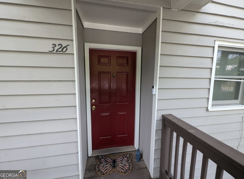 Come check out this amazing recently updated End unit Condo in Rivers Edge community. Conveniently located within minutes of shopping, dinning and so much more. Just a short 7 min drive to Uga. Inside you'll find an open floor plan flowing seamlessly through out the kitchen dinning and living areas. Huge Master bedroom with large walk-in closet and en suite bath. Two additional bedrooms share hallway bath. Includes covered screened in porch perfect for relaxing outdoors. Recent updates include new windows, Kitchen Sink, Refrigerator, dishwasher, garbage disposal, carpets, window blinds, and screened in porch. Schedule your showing today!