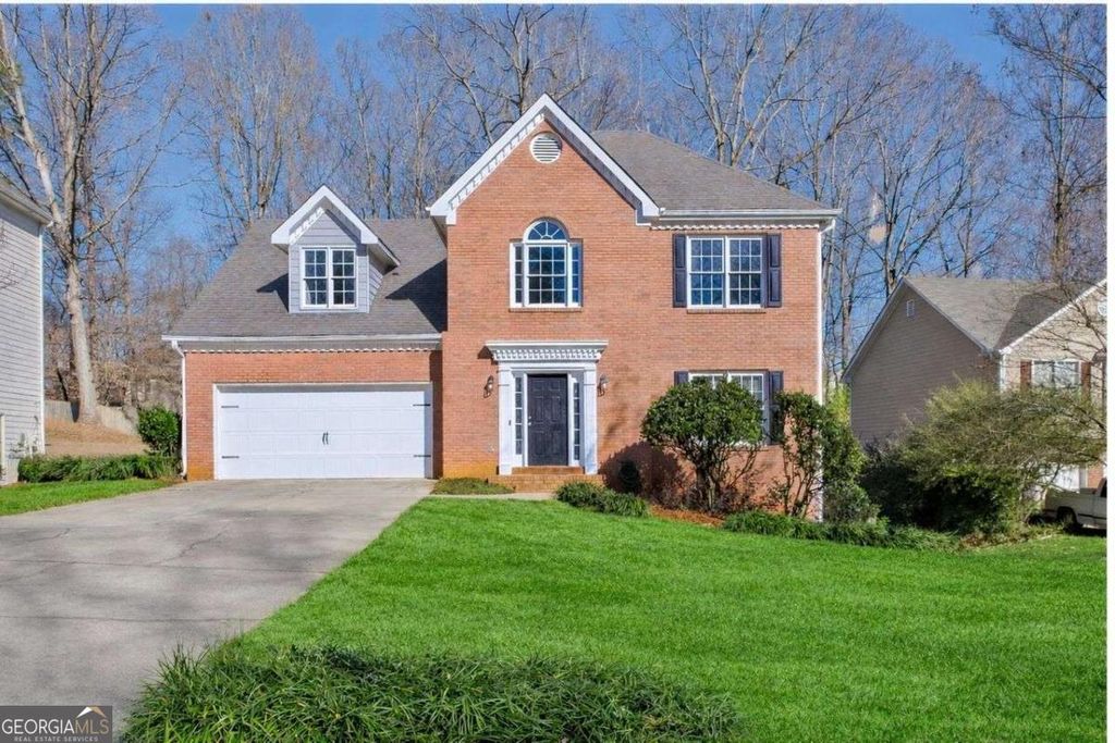 Photo of 680 SOMERSET VALE Drive, Lawrenceville, GA 30044 (MLS # 10712986)