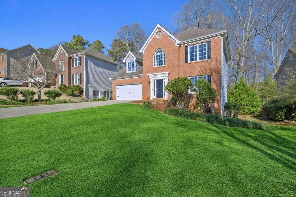 Photo of 680 SOMERSET VALE Drive, Lawrenceville, GA 30044 (MLS # 10712986)