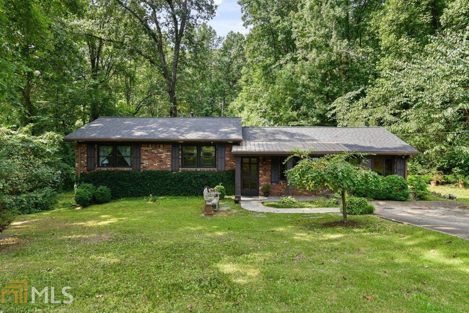 Come see this delightful home! Formal living room to greet guests. Hardwood Floors throughout. Eat in kitchen. Great floor plan with Family room with Vaulted Ceilings. Master bedroom has en-suite bath and Generously sized secondary bedrooms. Finished basement with a full bath perfect for media room, work out space, or even an extra bedroom. Large screened in porch overlooking Large private backyard with gardens. Large workshop in yard for storage. New roof and gutters, recently replaced HVAC and all new windows! Easy access to I-285, downtown Atlanta and the new Braves stadium!!