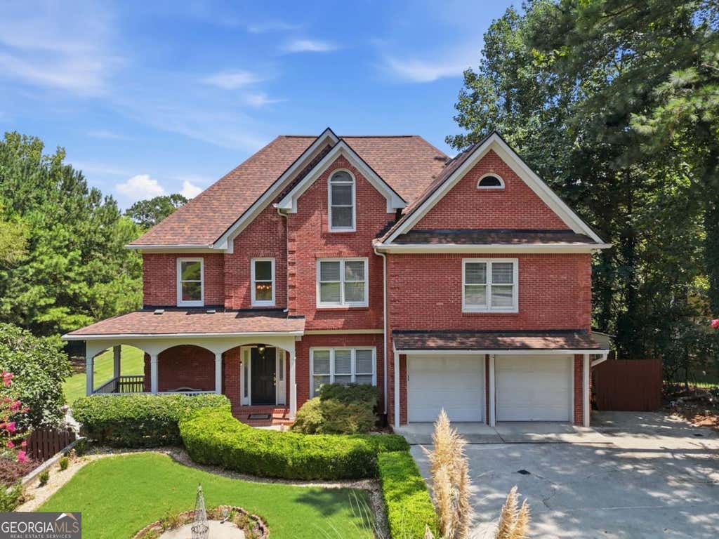 Photo of 1340 Eryn Cir, Suwanee, GA 30024 (MLS # 10825969)