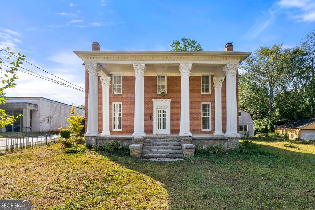 Photo of 3021 Stone Mountain Street, Lithonia, GA 30058 (MLS # 10625300)