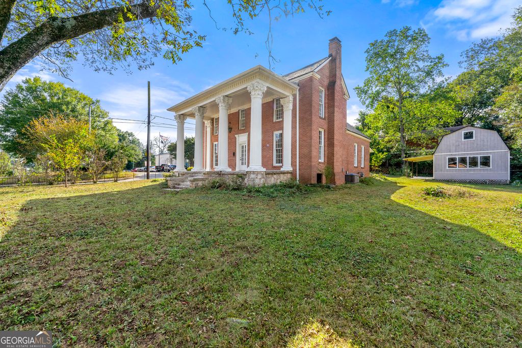 Photo of 3021 Stone Mountain Street, Lithonia, GA 30058 (MLS # 10625300)