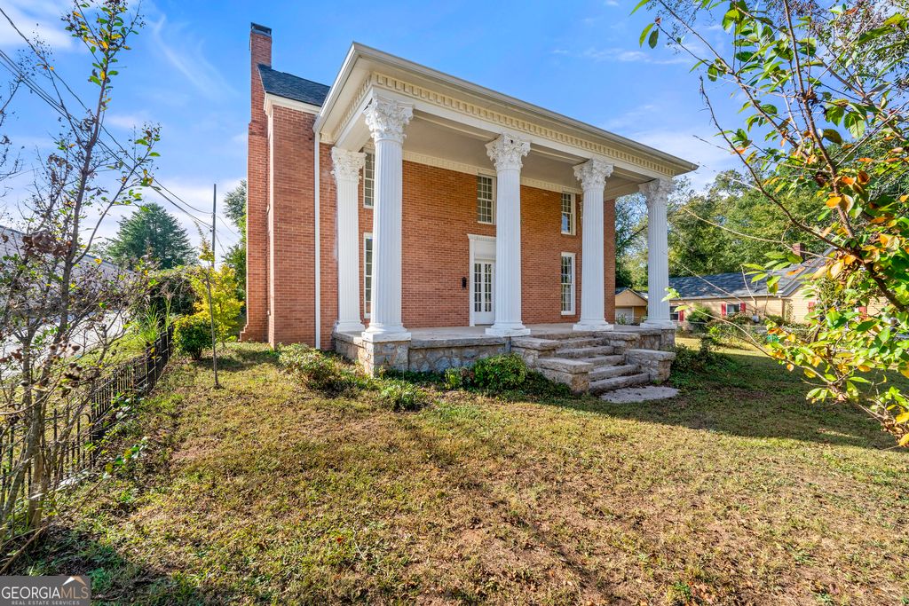 Photo of 3021 Stone Mountain Street, Lithonia, GA 30058 (MLS # 10625300)