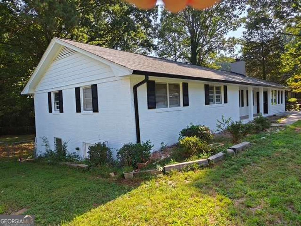 Photo of 1296 Scenic Way SW, Lilburn, GA 30047 (MLS # 10706709)