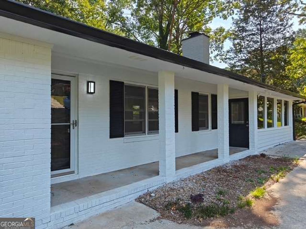 Photo of 1296 Scenic Way SW, Lilburn, GA 30047 (MLS # 10706709)