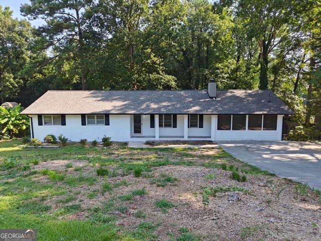 Photo of 1296 Scenic Way SW, Lilburn, GA 30047 (MLS # 10706709)