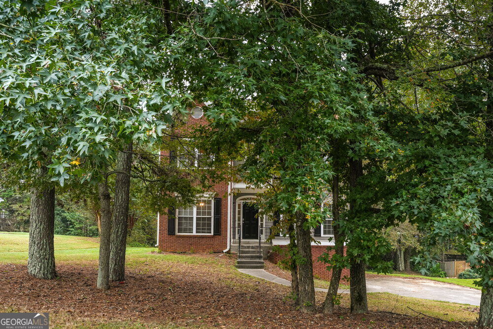 Photo of 1307 Highfield Drive NE, Lawrenceville, GA 30043 (MLS # 10872463)