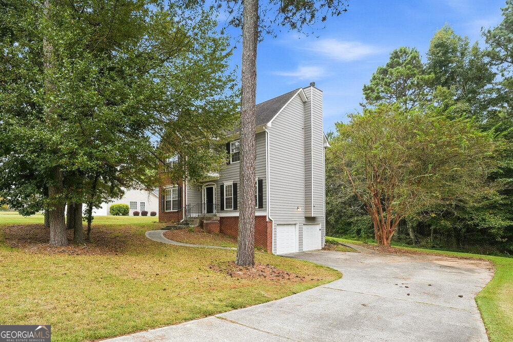 Photo of 1307 Highfield Drive NE, Lawrenceville, GA 30043 (MLS # 10872463)