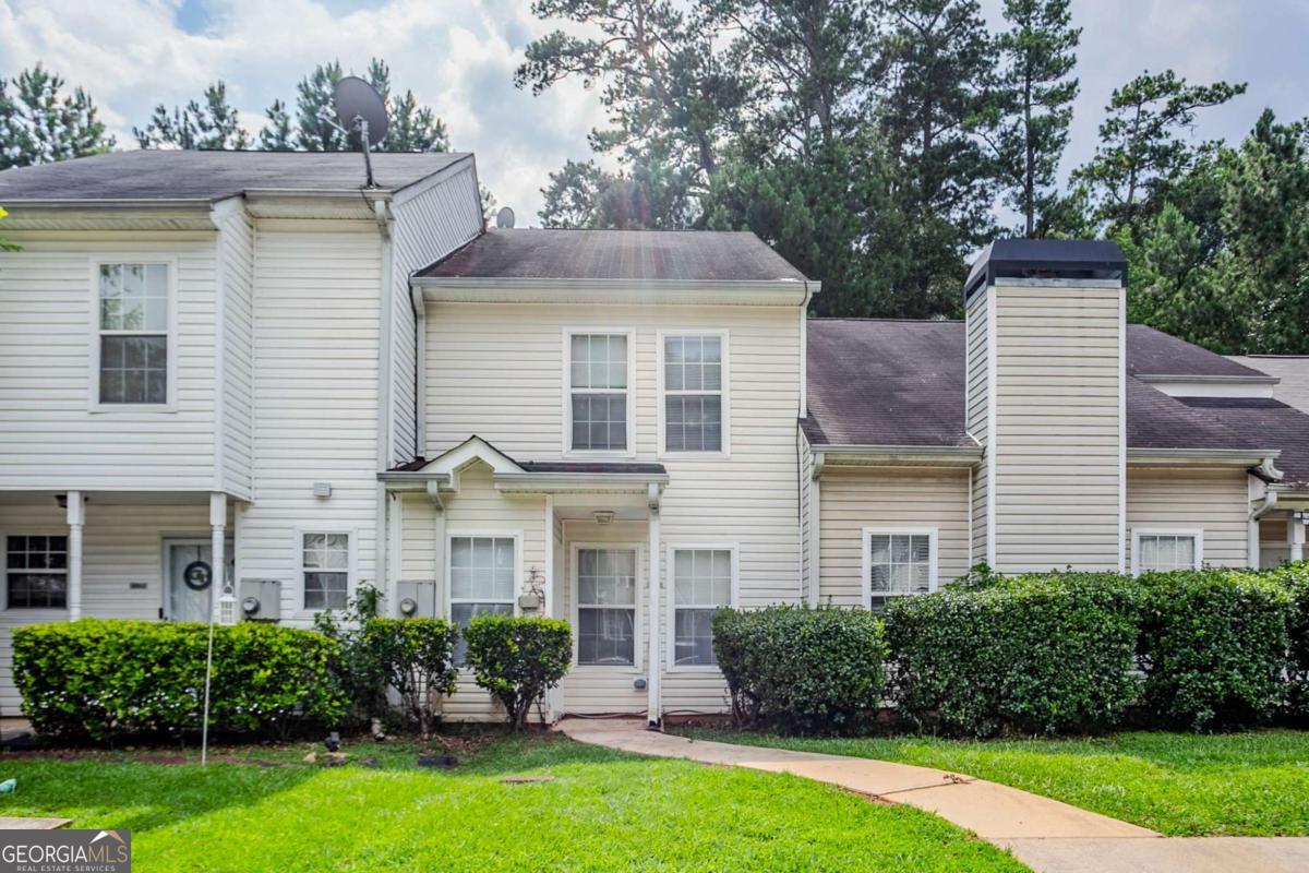 Charming 2-bedroom, 1.5-bath townhome located in the quiet and well-kept Wellington Chase community. The main level offers a functional layout with a spacious living area, eat-in kitchen with ample cabinet storage, double pantry, and a convenient built-in desk nook-perfect for working from home. French doors lead to a private patio, ideal for relaxing or outdoor dining. Upstairs, you'll find two well-sized bedrooms with generous closet space and a full bath. This home is perfect for first-time buyers or investors looking for low-maintenance living in a location close to shopping, restaurants, I-20, and public transportation.