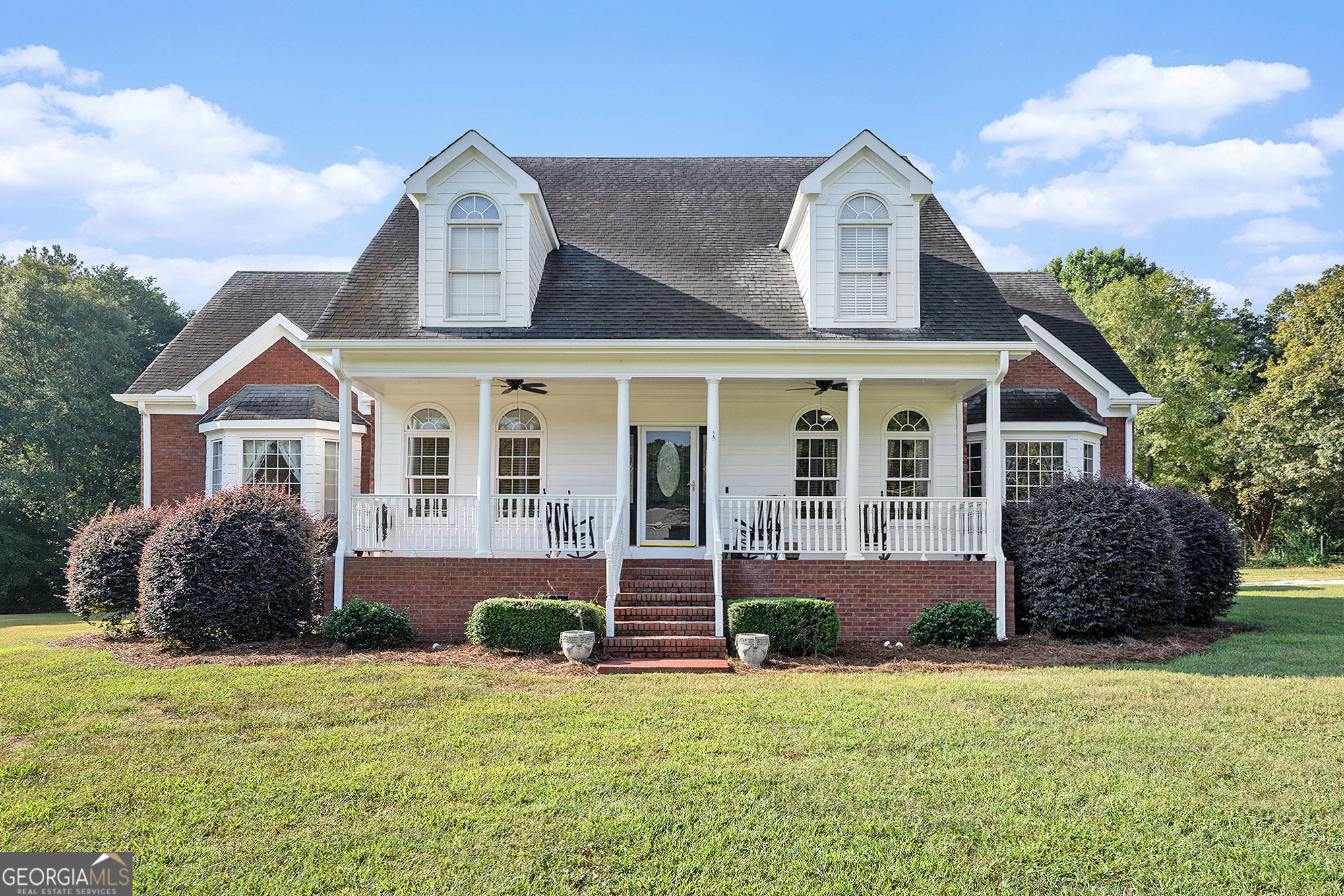 Over 3 acres of usable land in a great location! Custom home with high ceilings and loads of natural light. Hardwood floors. Oversized master suite on the main with separate sitting room. New composite deck. Large garage with workshops and plenty of storage space for all of your equipment. Seller will replace the roof with a full price offer and allow buyer to select the shingle color. Don't miss your chance on this one!