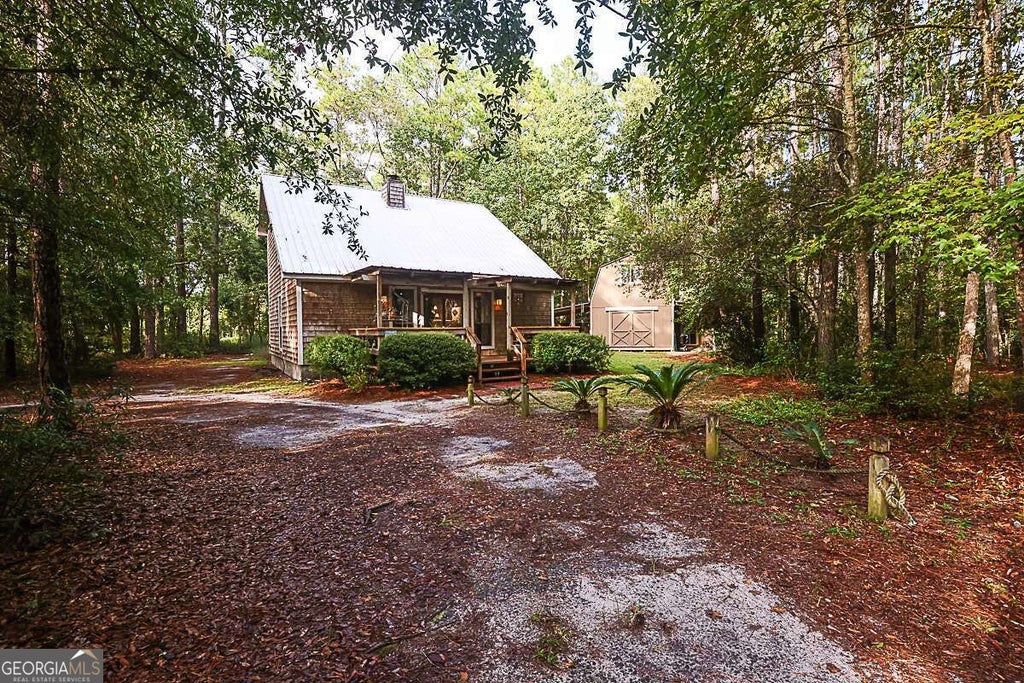 Photo of 401 Noel C Conaway Road, Guyton, GA 31312 (MLS # 10845844)
