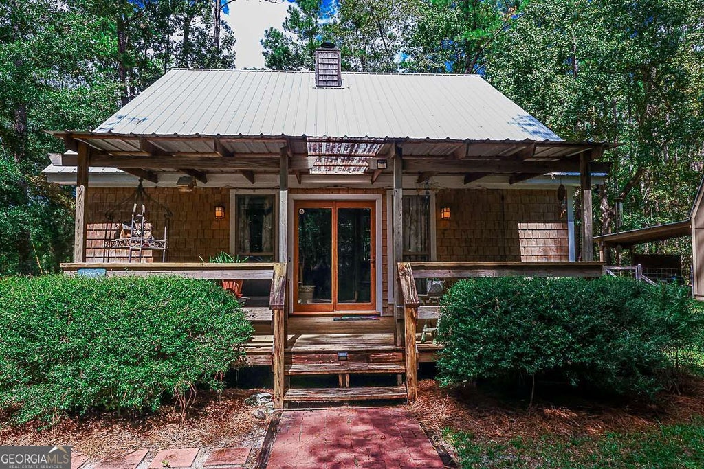 Photo of 401 Noel C Conaway Road, Guyton, GA 31312 (MLS # 10845844)