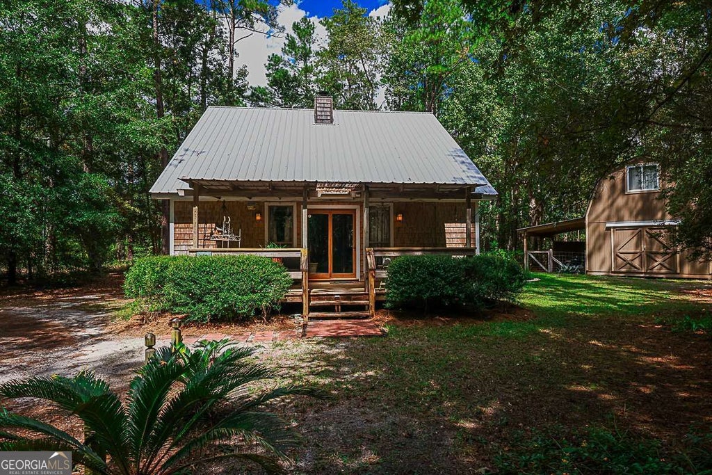 Photo of 401 Noel C Conaway Road, Guyton, GA 31312 (MLS # 10845844)