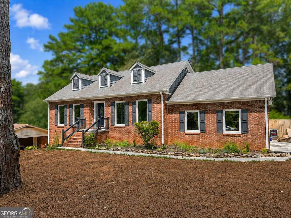 Photo of 4521 S Roberts Drive, Buford, GA 30518 (MLS # 10825832)
