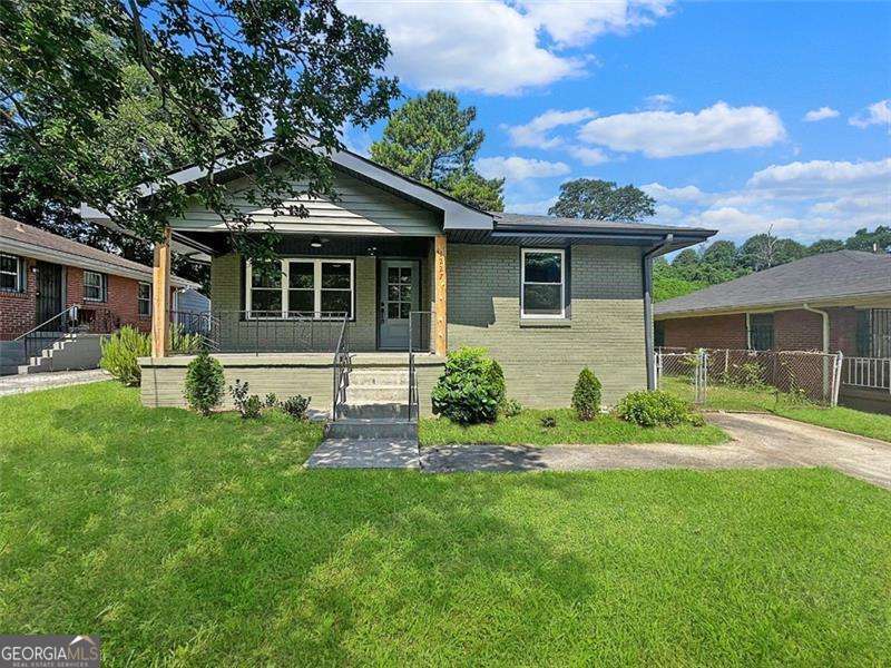 Location! Location! Location! 1.5 blocks from Grant Park's Beacon. 1.5 blocks from coffee shops, restaurant and the Beltline. This adorable completely renovated bungalow has all new everything. Open concept, white kitchen cabinets, granite countertops, SS appliances opens to the dining area and living room. Owner's suite has a his and hers closet with a large tiled, double headed shower and double vanity sink. With an additional bedroom and bathroom. This lot is zoned R5 if you ever want to do any expansion.