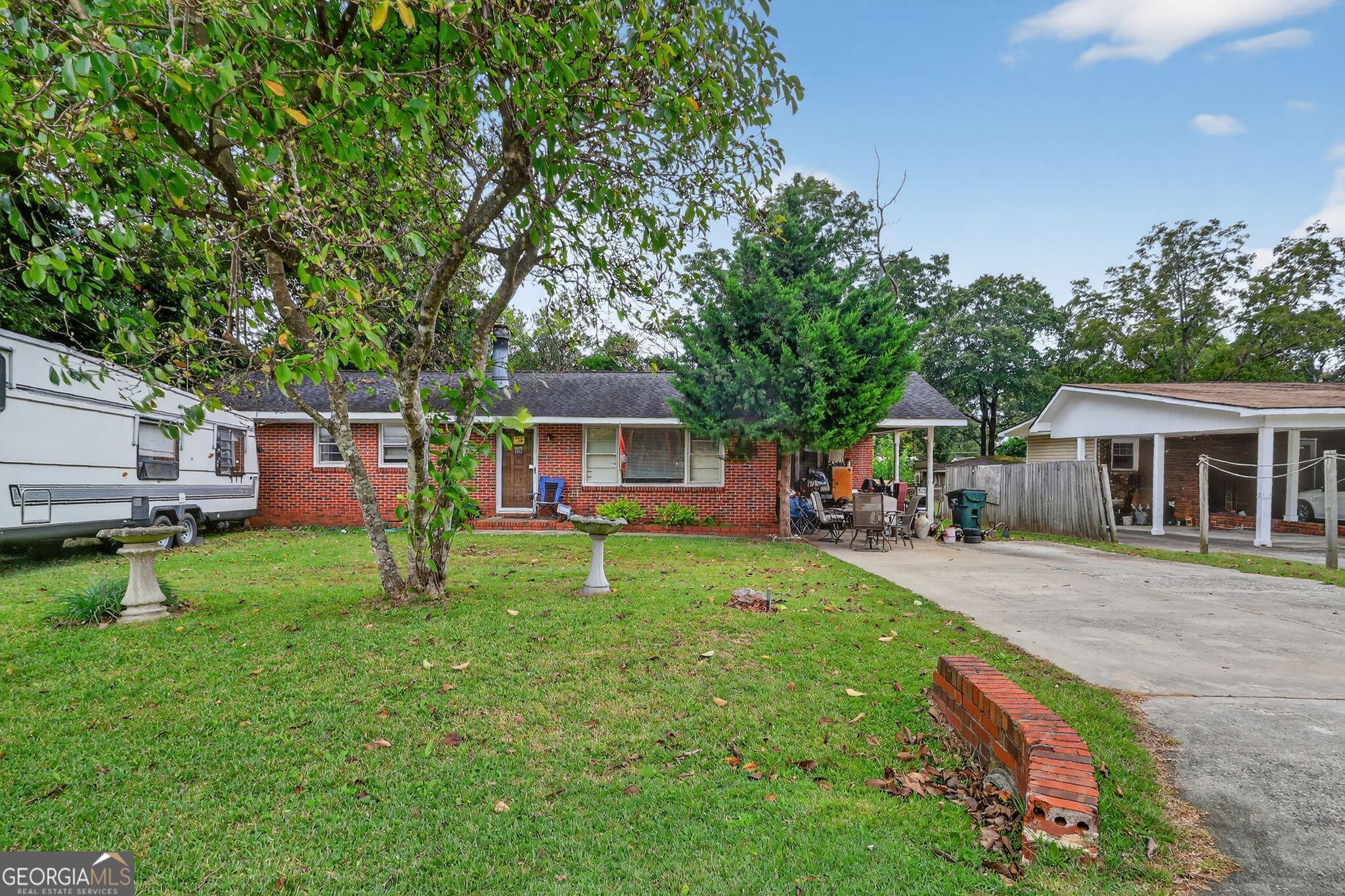 Welcome to 203 Jackson Street - a charming 3-bed, 2.5-bath, 1,684 sq ft home located in the heart of Warner Robins! This property is move-in ready and offers incredible potential for both homeowners and investors alike. Step inside to find a spacious living area, large bedrooms, and a functional floor plan that's perfect for everyday living. The home already has great bones with a newer roof (2017), updated HVAC and water heater (2010), and only needs a few light cosmetic touches to make it shine. Enjoy a fenced backyard with plenty of space for entertaining, gardening, or simply relaxing after a long day. Conveniently located near Robins Air Force Base, schools, shopping, and restaurants, this property delivers comfort and convenience in one package. Whether you're looking for a turnkey rental, a starter home, or your next value-add project, this one checks all the boxes!
