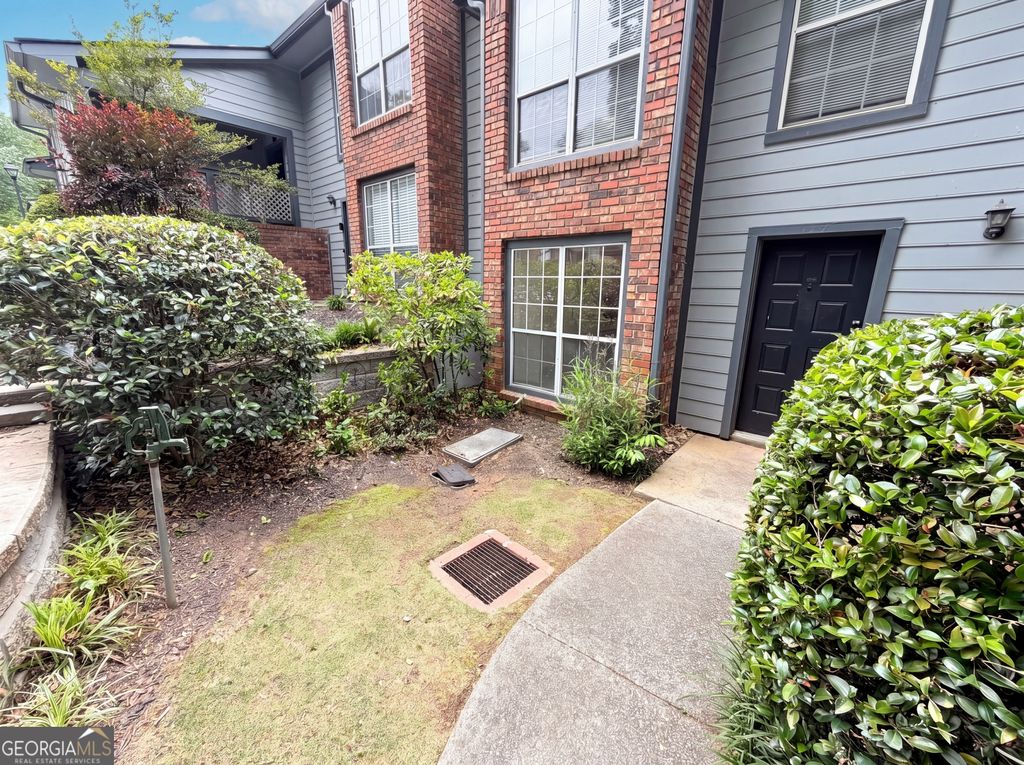 Photo of 1128 Weatherstone Drive NE, Atlanta, GA 30324 (MLS # 10757891)