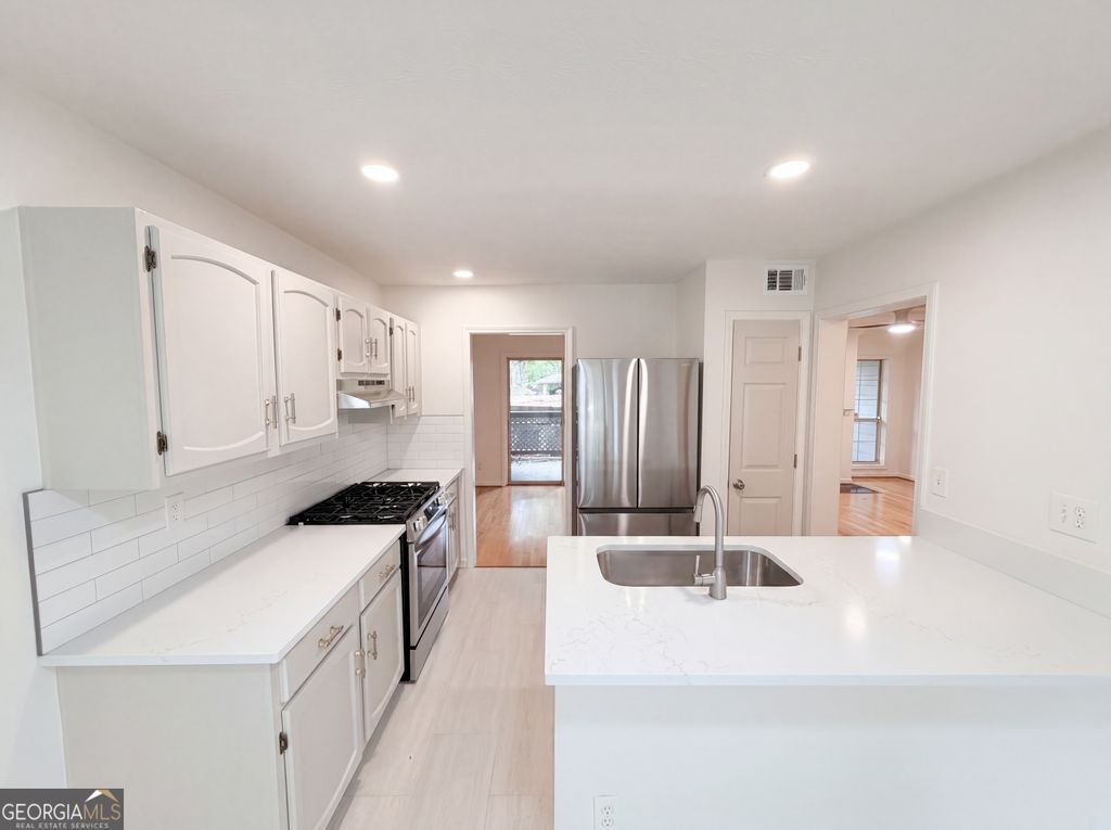 Photo of 1128 Weatherstone Drive NE, Atlanta, GA 30324 (MLS # 10757891)