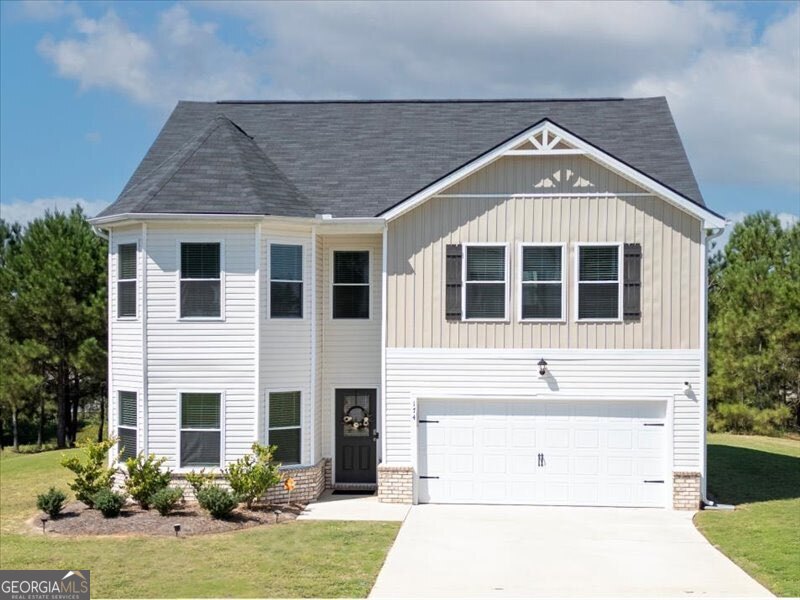 Welcome home to this beautifully designed ALMOST NEW 5 Bedroom, 3 Bathroom Residence in Macon, GA nestled on a Generous .33 Acre Flat Lot, with endless possibilities for outdoor living. Built in May 2022, this home offers the perfect blend of modern comfort and timeless style. Step inside to a spacious foyer with a wide entrance leading into the open-concept family room and kitchen. The main level bedroom is ideal for guests who prefer no stairs, or can double as a home office with charming bay windows overlooking the front yard. Throughout the main level, luxury vinyl plank flooring provides durability and style, while the kitchen shines with upgraded granite countertops, rich cabinetry, and stainless steel appliances. Flooded with natural light, the family room opens seamlessly to the backyard, creating the perfect setting for gatherings. Upstairs, retreat to the expansive owner's suite, featuring a spa like bathroom with a double vanity and two separate walk in closets. Additional bedrooms upstairs offer plenty of space for family, guests, or even a home gym. The convenient second-floor laundry makes daily life a breeze. With room to grow, entertain, and enjoy, this home checks every box for today's lifestyle whether hosting holidays, working from home, or relaxing in your private backyard.