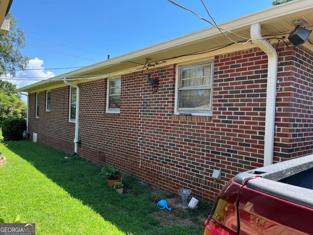 Photo of 1496 Railroad Avenue, Sugar Hill, GA 30518 (MLS # 10656161)