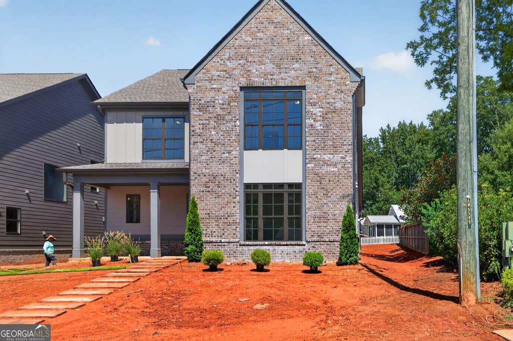 Photo of 5808 Mitchell Street, Flowery Branch, GA 30542 (MLS # 10829451)