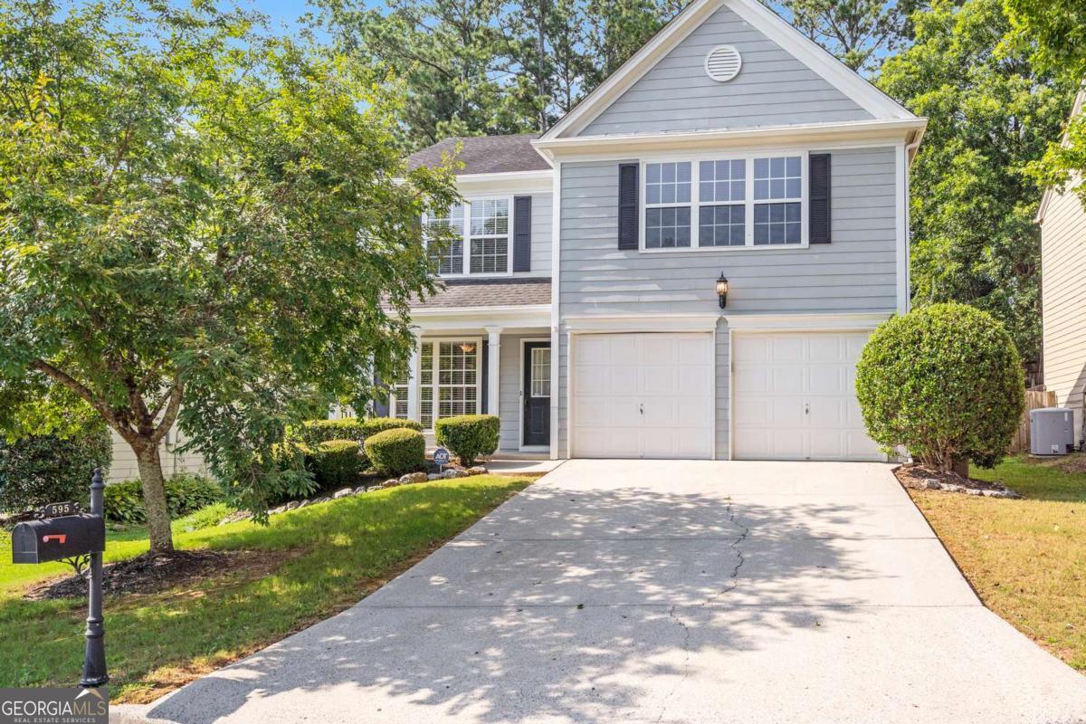 Located just a very short distance from Downtown Alpharetta- this is what you are looking for and so affordable in this area! Upon entering you will notice the gleaming floors on the entire main level .The charming and spacious dining room with wainscoting treatment below a chair rail is adjacent to an open kitchen with plenty of countertop space and cabinetry plus the breakfast room area. You will enjoy gas cooking along with other GE appliances. The family room is dramatic with a soaring ceiling and the fireplace flanked by two-story windows with a view of your private rear yard. Plenty of space to enjoy the time outside on a huge rear patio. Private rear yard is fenced for safety in playtime and for your pets! Extra outside storage in shed at rear of property- perfect place to keep your outside lawn equipment. The upper level is complete with 2 secondary bedrooms with spacious closets and a shared bath plus Owner's retreat which is vaulted and will accommodate large furnishings! The Owners bath has 2 separate areas with sinks and plenty of space for getting ready for your day in the morning or unwinding in the soaking tub in the later part of your day.... Ahhhh!. There is also a shower for those times when you are rushed to get ready and go! The large walk-in closet will be enough space for all your garments and accessories.... plus more! If you are looking for great AWARD-winning schools,(Cogburn Woods Elementary,Hopewell Middle and CAMBRIDGE HIGH SCHOOL) ease for shopping, all kinds of eating establishments and entertainment - plus Lake Sidney Lanier just a few miles away for endless recreation possibilities- Look no further! Make an appointment today to make this your next home and be convenient to everything in a nice quiet neighborhood with pool, tennis and playground.