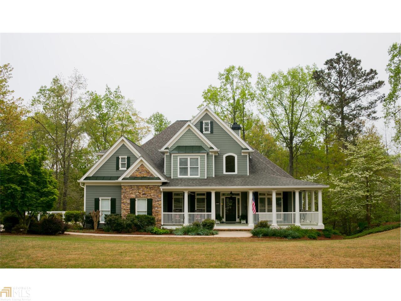 METICULOUSLY MAINTAINED HOME. MOVE-IN READY! LAKE N'HOOD & ONLY 3 MILES TO PUBLIC BOAT RAMP. MASTER ON THE MAIN. BEAUTIFULLY LANDSCAPED FRONT YARD. MUST SEE WOODED TREE-TOP VIEW FROM DECK, PORCH, AND MASTER! GREAT ENTERTAINERS HOME W/OPEN FLOOR PLAN. FINISHED BASEMENT WITH LOTS OF WINDOWS AND PRIVATE DECK. AMPLE STORAGE IN BASEMENT WITH BUILT-IN SHELVING. THIS IS THE BUILDER'S PERSONAL HOME AND GREAT CARE WAS TAKEN WHILE BUILDING. CENTRALLY LOCATED BETWEEN CUMMING, GAINESVILLE, AND DAWSONVILLE. QUICK ACCESS TO OUTLET MALL, LAKE LANIER AND HISTORIC DAHLONEGA. MUST SEE!