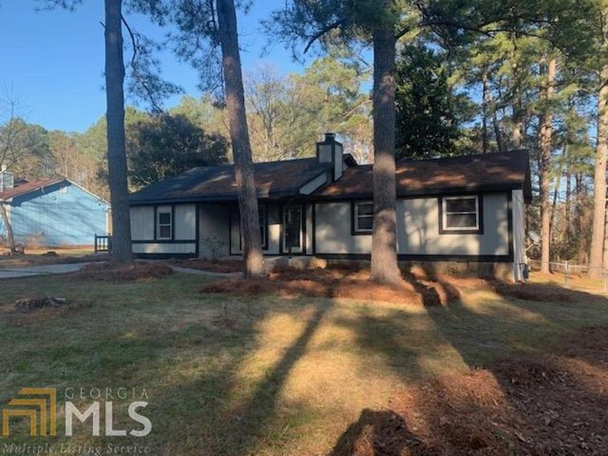 Spacious Ranch Home on Large Fenced Level Lot, relatively close to Parks, Shopping and Interstate.  There's tons of Storage in this 3-Bedroom, 2-Bath Ranch with a Comfortable Open Floor-plan and Roomy Kitchen. An additional Bonus Room with Interior and Exterior Access can be used as a 4th Bedroom or Office. Bright and Airy, Great Room with Vaulted Ceilings and Fireplace lead to the Backyard with an Oversized Deck that is Perfect for Entertaining. This could be your Dream Home with just a few upgrades. Easy renovation loans available to put in your personal touches. Sold AS-IS with No Disclosure.
