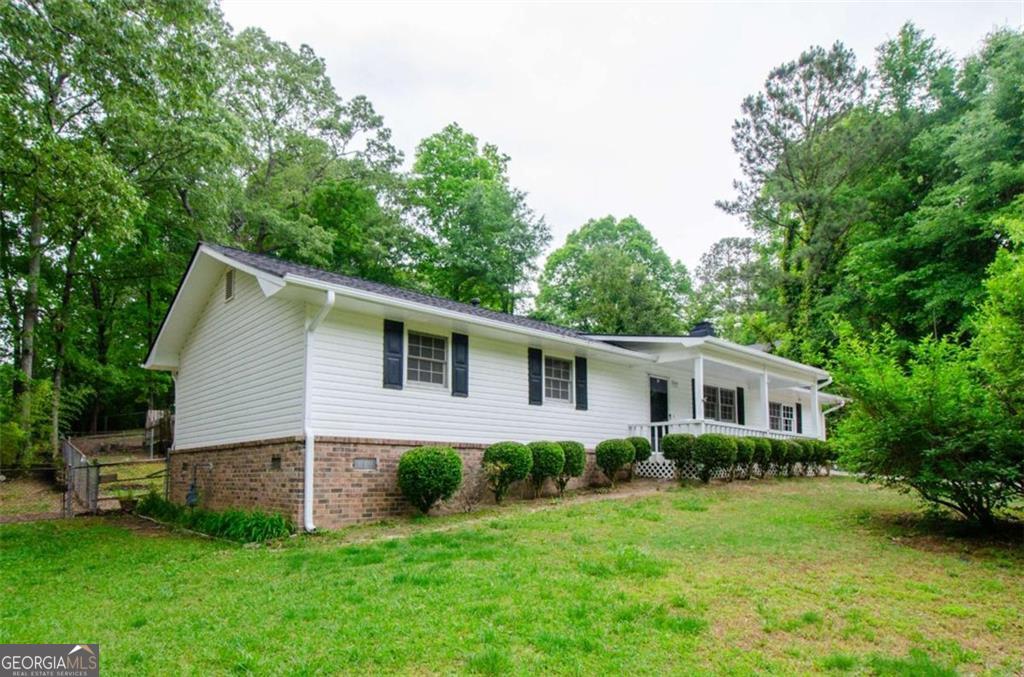 Spacious 3-Bedroom Home for Rent in Stone Mountain! Discover the perfect blend of comfort and convenience in this charming 3-bedroom, 2-bathroom home nestled in a quiet, family-friendly neighborhood in Stone Mountain. This home features a bright, open floor plan with a generously sized living room, perfect for both relaxing and entertaining. The kitchen offers ample cabinetry and counter space, ideal for everyday cooking or hosting guests. Each bedroom is comfortably sized with great closet space, while the master suite includes a private en-suite bathroom for your convenience. Step outside to a private backyard oasis, perfect for weekend BBQs, gardening, or simply enjoying the Georgia sunshine. Located near local parks, shopping, schools, and with easy access to major highways, this home offers both tranquility and practicality for your lifestyle needs. Ready for immediate move-in! Schedule your private tour today and make 2923 Bicentennial Drive your new home!