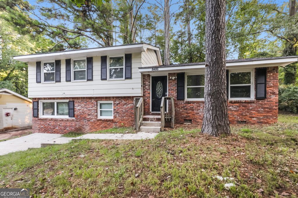 Photo of 8486 Magnolia Drive, Jonesboro, GA 30238 (MLS # 10805382)