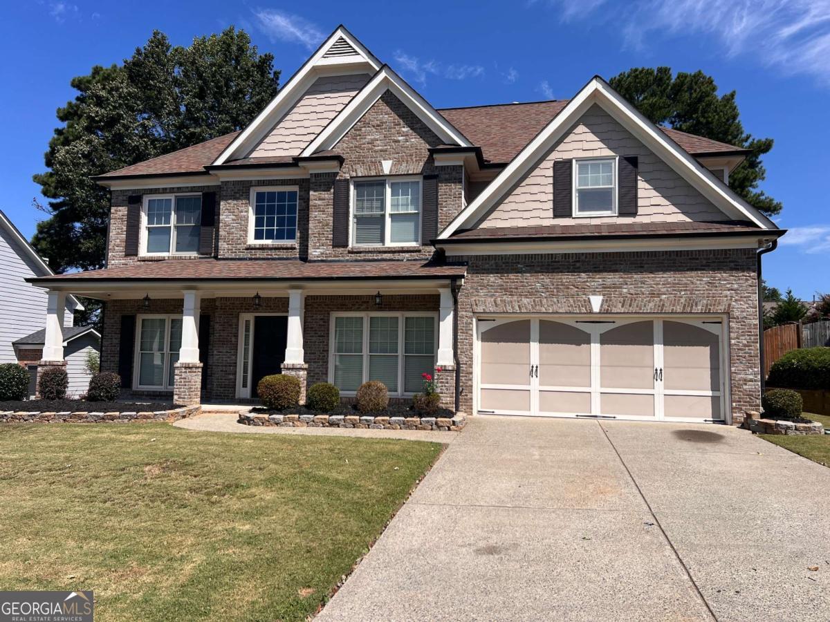 This home has it all! Bright open 2 story foyer and family room open to gorgeous kitchen w/island and walk in pantry. Guest bedroom and full bathroom on main floor, formal living and dining room w/ beautiful crown molding and extensive trim! Continue your living outdoors with a large covered patio wired for tv and 2 fans to use virtually year round! Relax outdoors in the large fenced in, private back yard with a massive shed/workshop for storage and/or workspace! Move right into this immaculate home which features a newer roof, water heater and ac units!