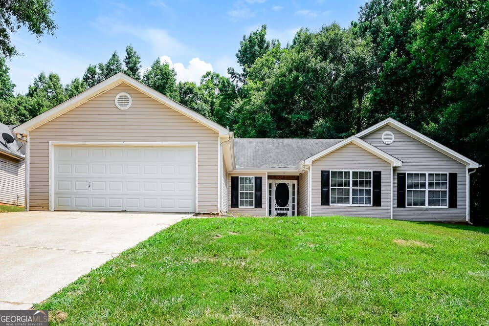 Photo of 125 Cheyenne Drive, Covington, GA 30016 (MLS # 10803176)