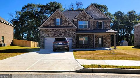 Photo of 5652 Laney Drive, Rex, GA 30273 (MLS # 10629214) Photo of 5652 Laney Drive, Rex, GA 30273 (MLS # 10629214)