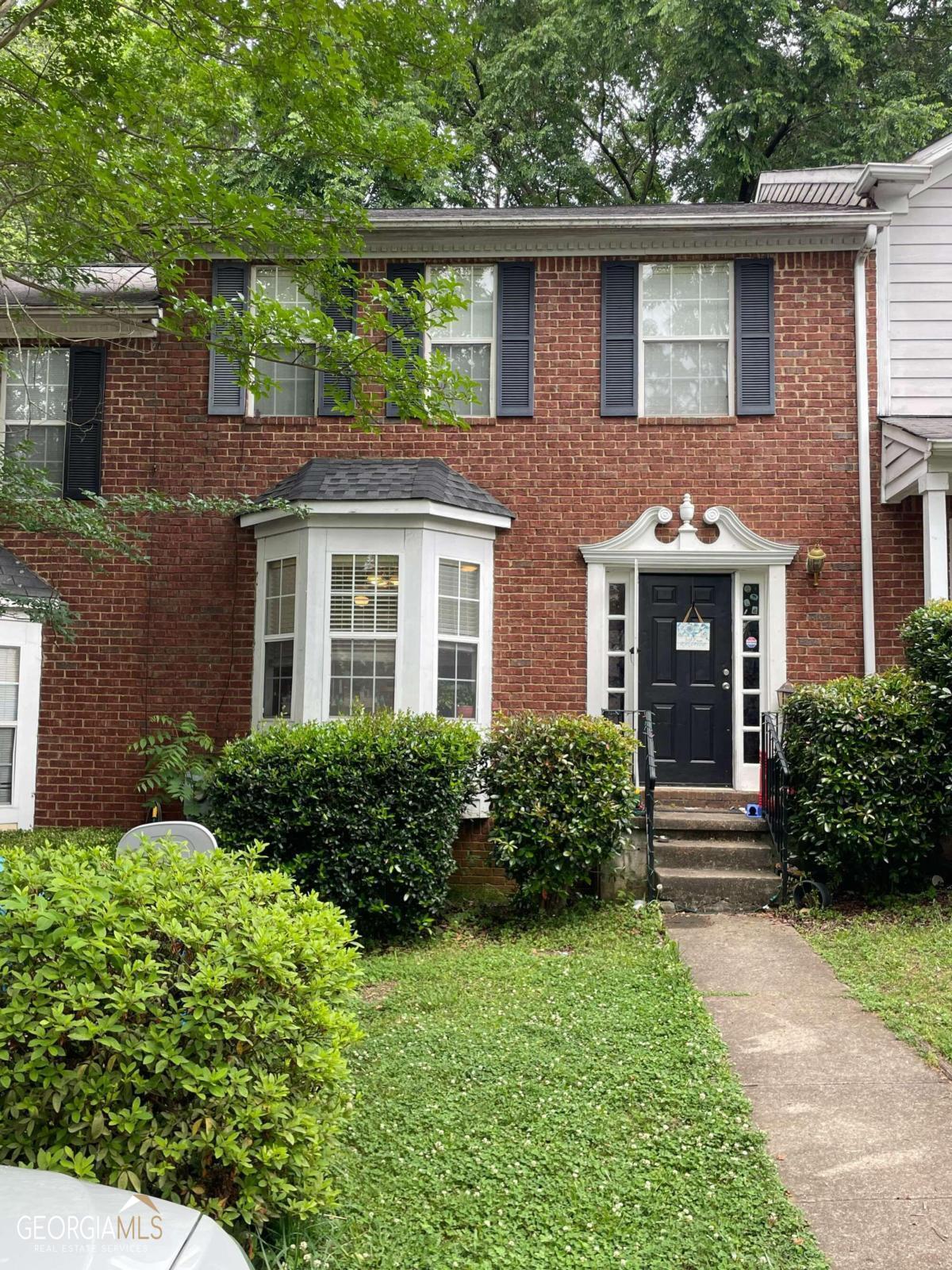 PRICE REDUCTION...Take notice of this desirable townhouse with no HOA, no rental restrictions, and located in a quiet community in Duluth, GA. This 2 story, brick front townhome has 3 bedrooms, 2 bathrooms, and the laundry closet all located on the upper level and the downstairs boasts a large, eat-in kitchen with ample cabinets, a pantry and a very spacious living room with gas fireplace and plenty of additional room to set up your small office space, home gym, or play area for children. Also, on the lower level, is a half bath and plenty of storage in the closet under the stairs. Near Shorty Howell Park with walking trails and playgrounds and minutes to Downtown Duluth, shopping and restaurants. Property being sold AS-IS, no repairs by seller.