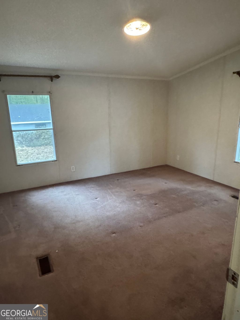 Photo of 105 Skyline Drive, Hampton, GA 30228 (MLS # 10632875)