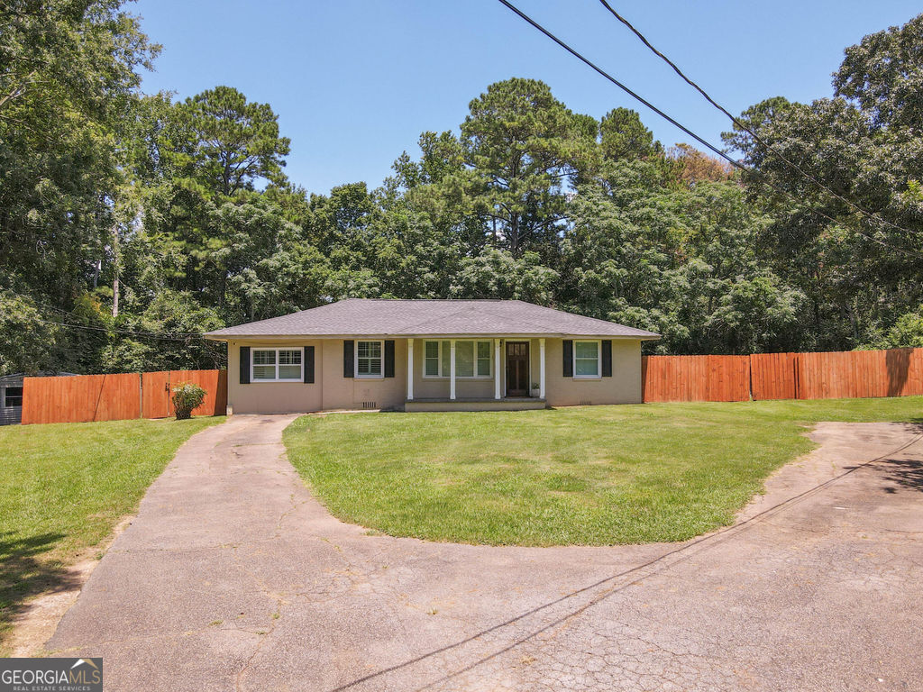 Beautifully updated and renovated brick ranch. This house has a large bonus room on one side of the house that would be great for a large home office, guest suite, or kids playroom to help you keep the rest of the house toy free for when friends and family come over. This house is move in ready! You don't need to do a thing! You've got pets? Bring them! Huge back yard and fully fenced in! If camping is your thing, the side yard gives access to the back yard with a double door gate on the fence. Store a camper, work trailer, or a boat all in the privacy of your backyard without even feeling cramped in the entertaining area. Fire pit area. Very close to West Point Lake and Highland Marina. Pull the trigger and come make this home yours!