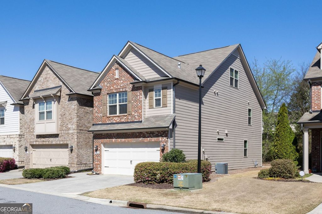 Photo of 8320 Village Place, Suwanee, GA 30024 (MLS # 10709993)