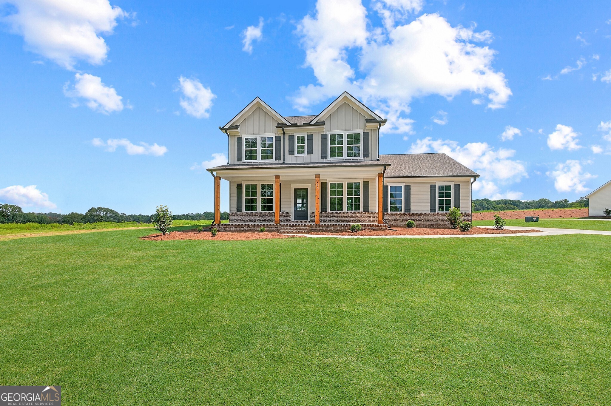 The Lakehurst plan built by My Home Communities. Quick Move-In! Welcome to this beautiful 4-bedroom, 3-bathroom two-story home, located in the desirable Monroe area just minutes from shopping, dining, and entertainment. This home boasts a bright gourmet kitchen, complete with a custom wood hood vent, wall oven, large quartz island, and breakfast area, all opening to the cozy family room. The formal dining room features elegant judges paneling, perfect for entertaining. Enjoy the outdoors on the covered back patio, overlooking a private, estate-sized lot. The oversized primary suite offers a retreat with a spa-inspired bathroom, including dual vanities a tiled super shower with niche bench and frameless door. Other highlights include LVP flooring, pendant lighting, cedar columns, and a 2-car side-entry garage with a convenient mud bench. Home comes with irrigation system. Schedule an appointment for a showing today! Contact us TODAY to learn about our Rates Starting as Low as 1.99%* with use of Seller's Preferred Lender! *Secondary photos are file photos -Matterport tour is an example of the floor plan and not of the actual listing*