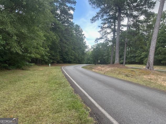 Build your dream home on this .9 acre lot in Forest Lake Village. Convenient to Eatonton and Milledgeville. Reasonable HOA fees. Restricted to site built homes.