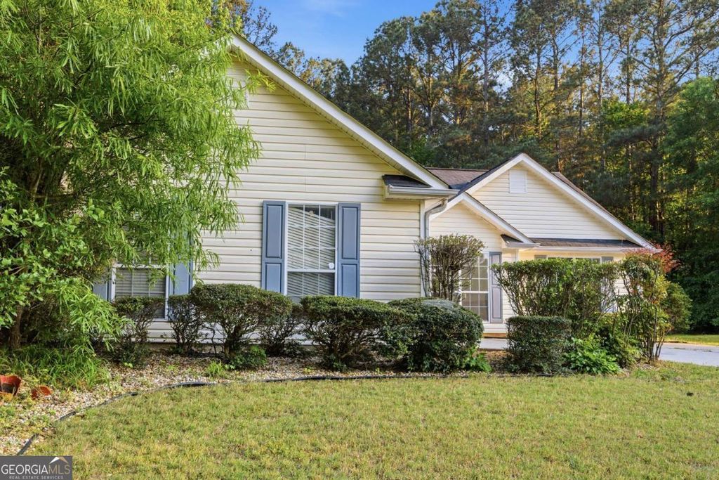 Photo of 165 The Falls Boulevard, Covington, GA 30016 (MLS # 10740720)