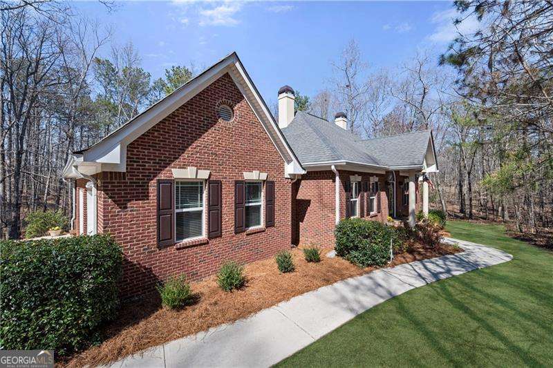 Welcome Home to this hard-to-find Four-Sided Brick Ranch Home on a Full Finished Basement located on 6.23 Acres! Custom built by Original Owners with attention to detail. Meticulously maintained! You will Love the Large Screened Porch overlooking Your Very Private Backyard. One-level Living at its best with lots of Natural Light, Wide Hallway, and Gleaming Hardwood Flooring. Arch Window and Cathedral Ceiling accent Entry Foyer. Elegant Dining Room perfect for hosting Holiday Gatherings. Warm inviting Kitchen with Breakfast Area and Expansive Windows with View of Backyard. Family room with cozy Fireplace for cool Fall and Winter Days. Spacious Primary Suite on Main with Cathedral Ceiling and Display Shelving. The Adjoining Ensuite features a Double Vanity, Jetted Tub, and a Separate Shower. Two additional Large Secondary Bedrooms on Main. Multi-Function Full Finished Basement is an Entertainer's Dream. A huge Recreation Room where Friends and Family will want to gather to enjoy the upcoming Football Season. This versatile space features a Spacious Bedroom, Bonus Room, and Full Bath perfect for a Teen or In-law Suite. Third Garage off Basement with Utility Sink is a great spot to store Gardening Tools/Lawn Equipment and more. Your Private Escape yet convenient to I-20, retail-rich Douglasville, Dallas, and more. South Douglas Elementary, Fairplay Middle, and Alexander High School. Close by you will find Sweetwater State Park offering Fishing, Hiking, Picnic Tables and more. Winston Park includes a playground, ballfields, and tennis courts. $3400 Lender Credit with Preferred Lender. Schedule your viewing today!